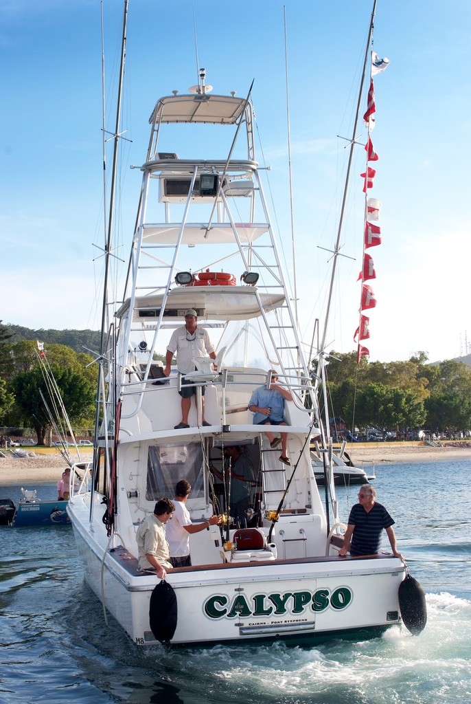Team ’Calypso’ after another ’tough day at the office.’ © BlueWater Power Yachts